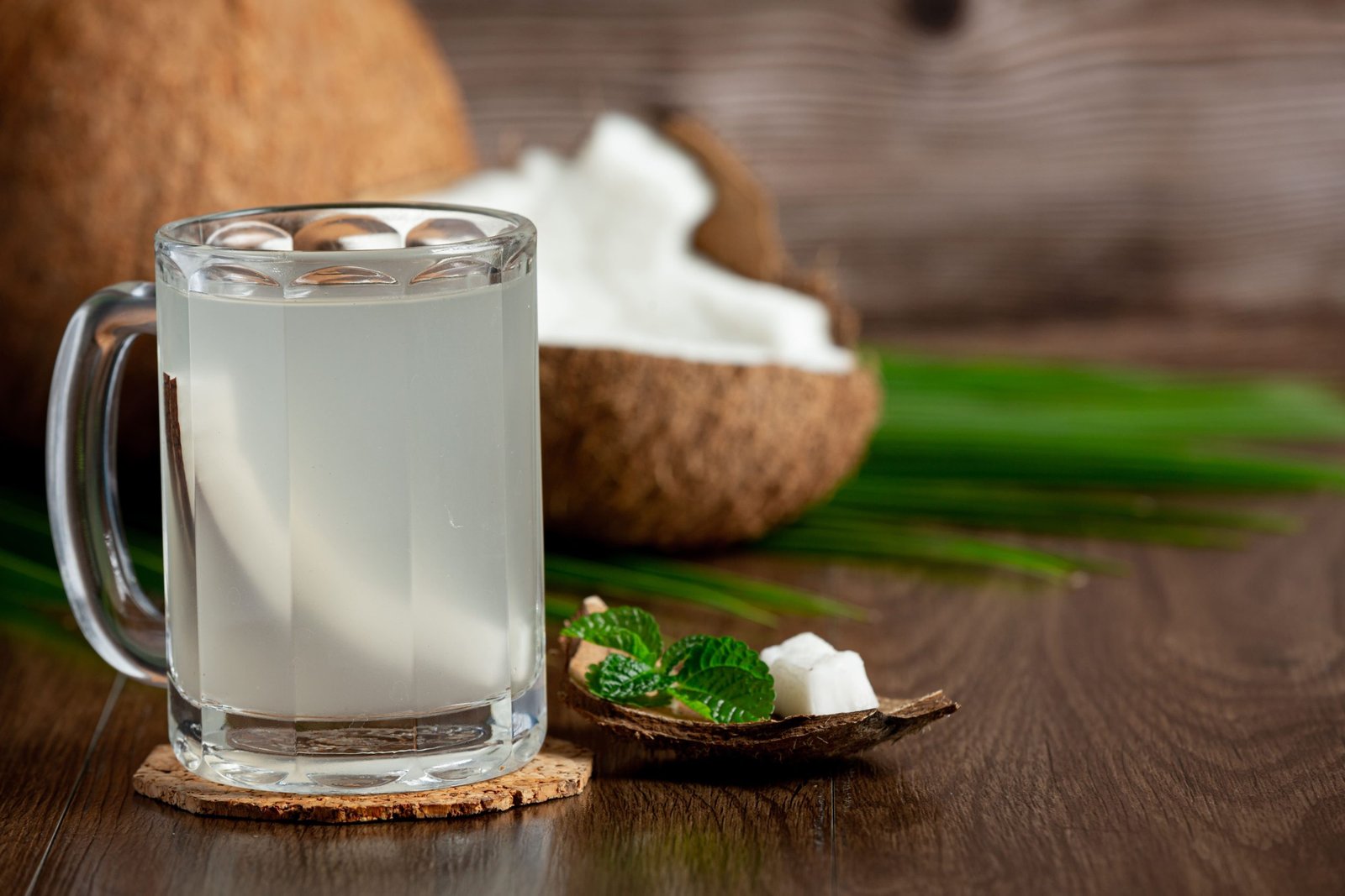 glass coconut water put dark wooden background min scaled